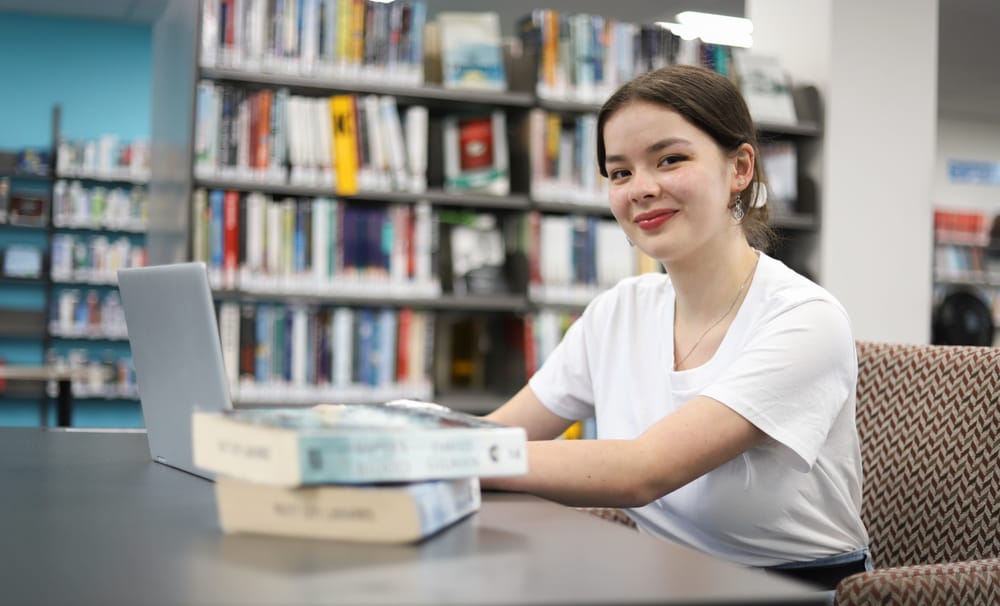 Student at the library post image