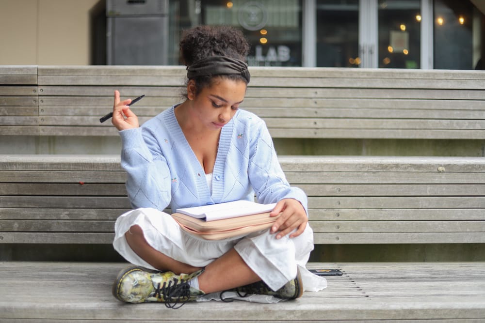 Young lady studying outside post image