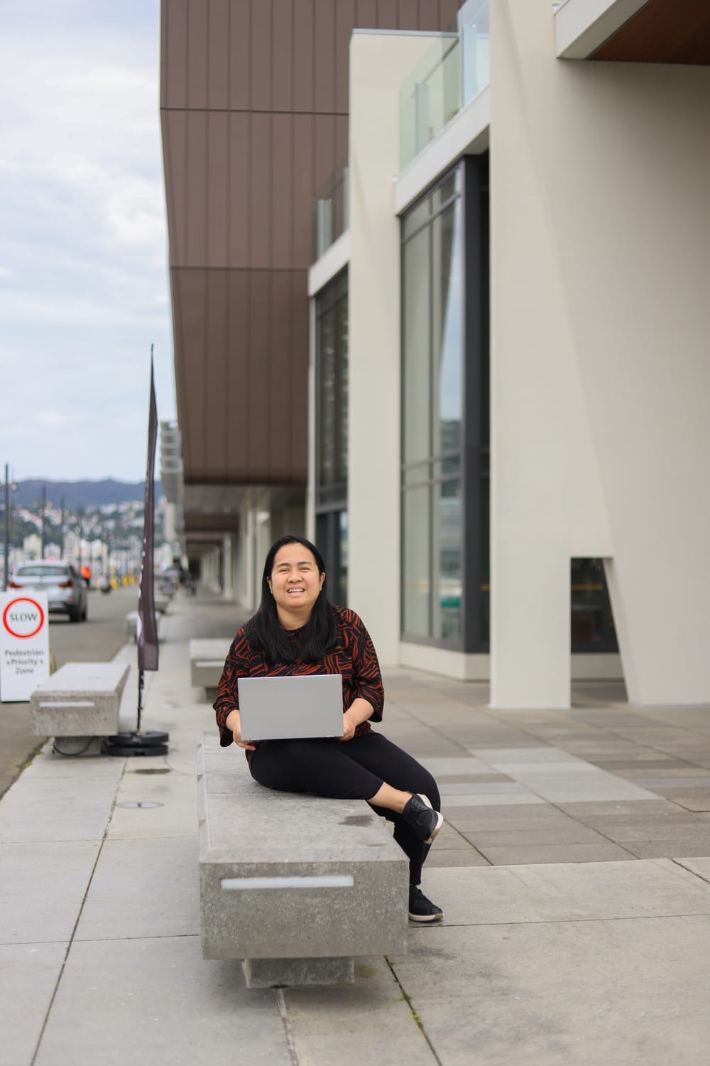 Smiling and working outdoors on the waterfront post image