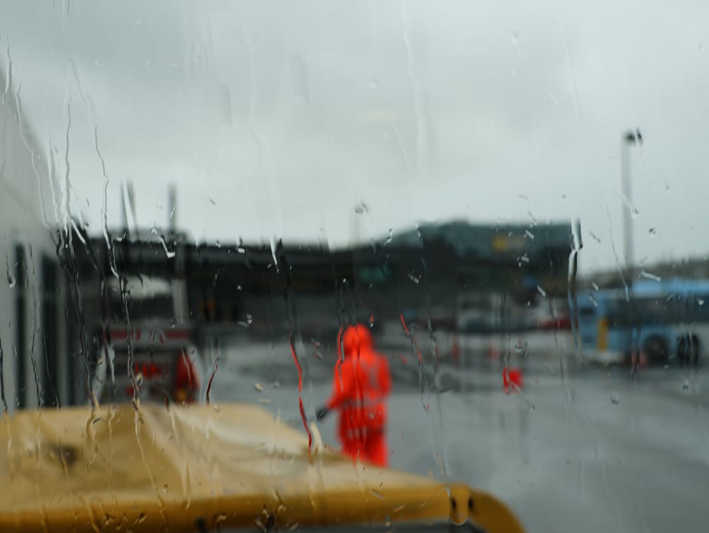 Through the glass: Rain at Wellington Airport post image