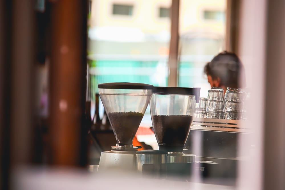 Coffee grinders in cafe post image