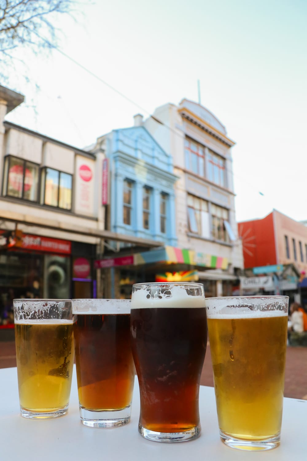 Four glasses of beer on table post image