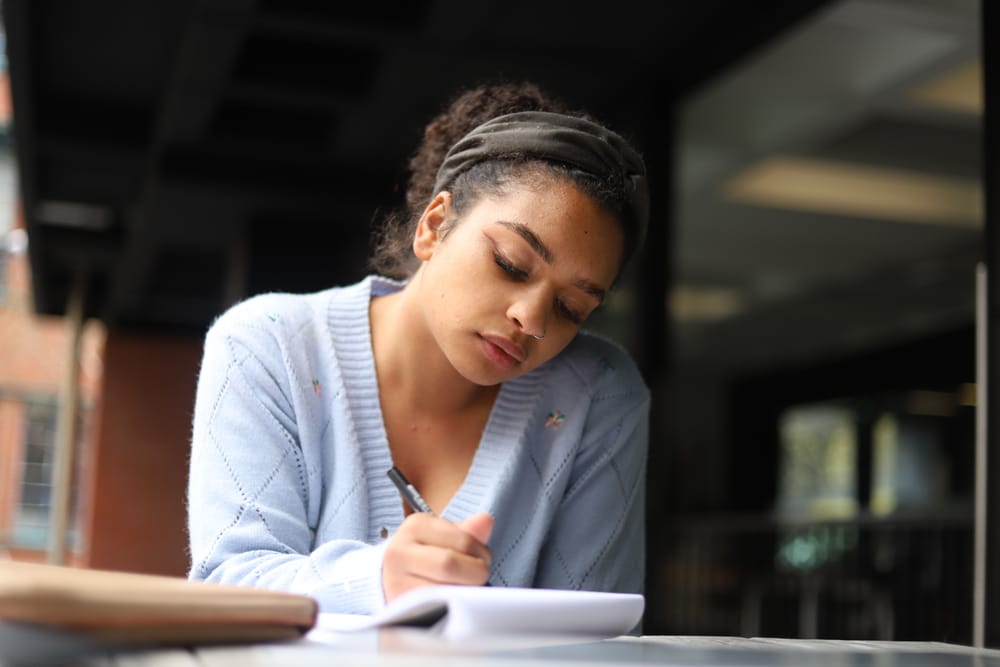Woman making notes post image
