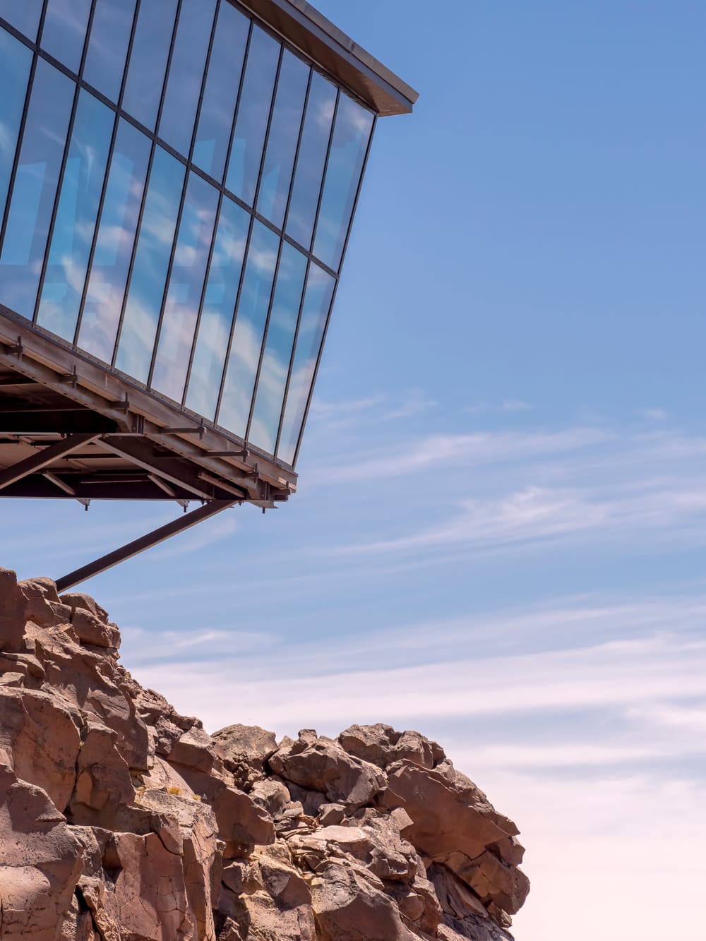Glass Building Rocks Mountain post image