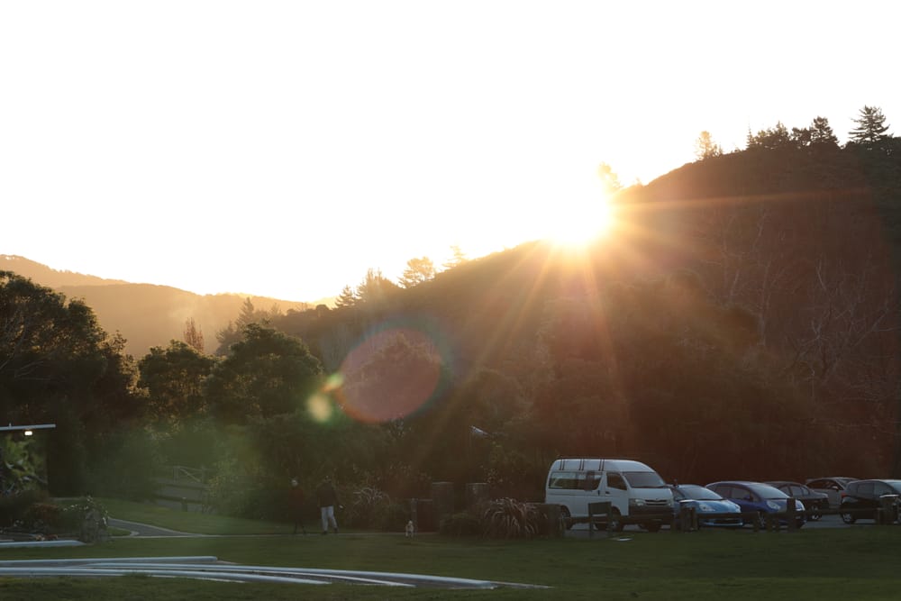 Sun is setting behind the hill post image