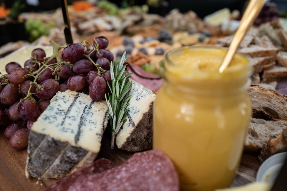 Charcuterie board with blue cheese and grapes post image