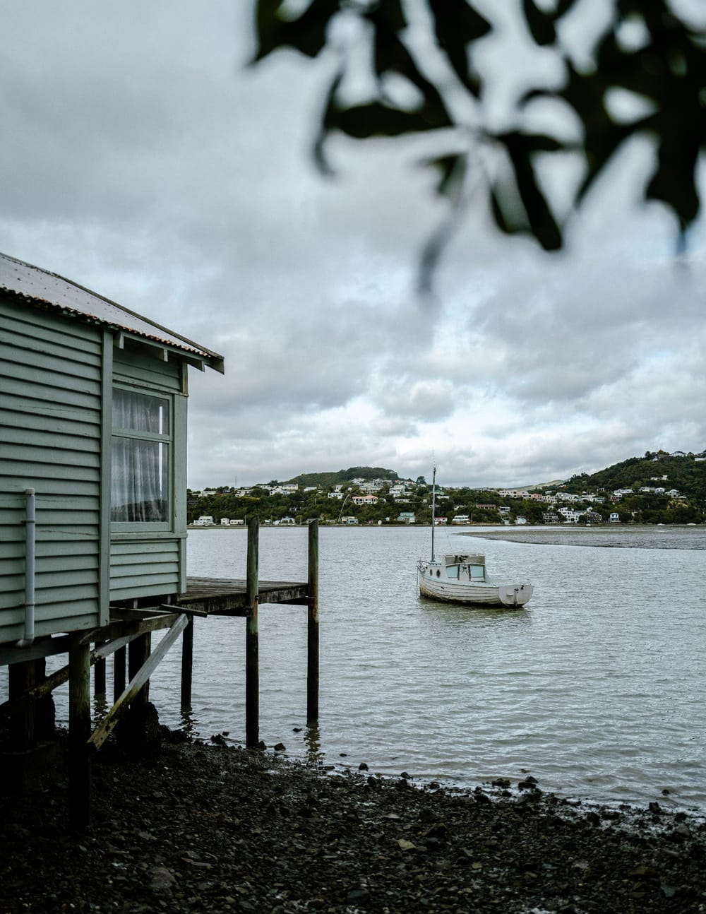 Coastal cabin and boat post image