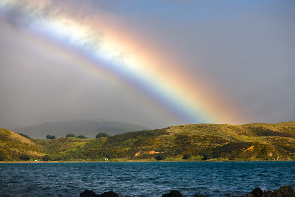 Rainbow over land post image