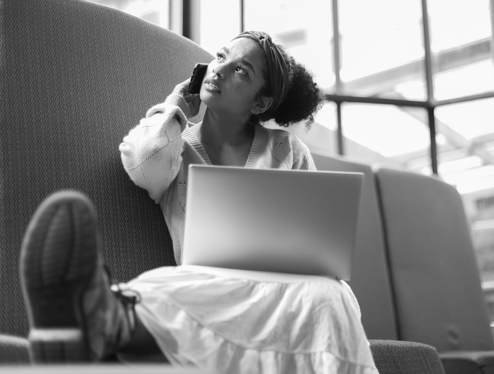 Busy young lady talking on the phone