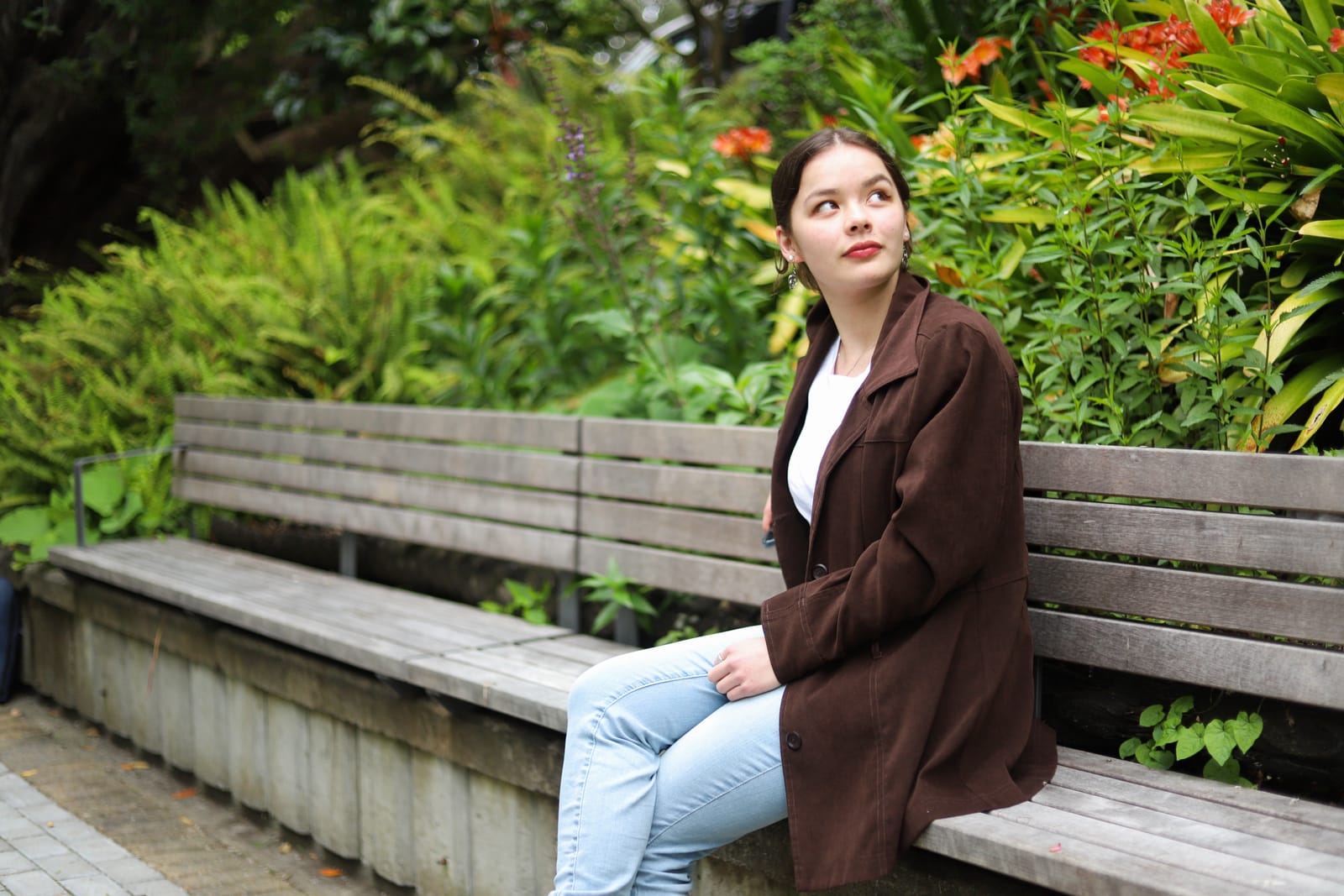 Young lady sitting in the park