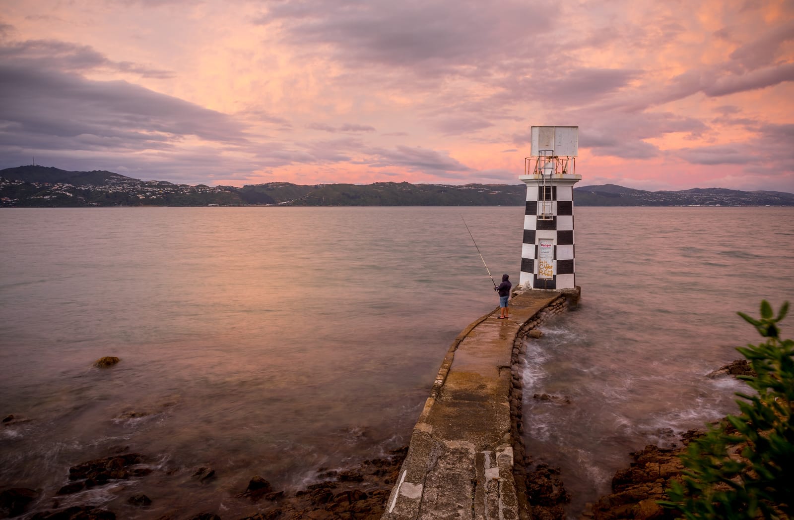 The Lighthouse Fisherman