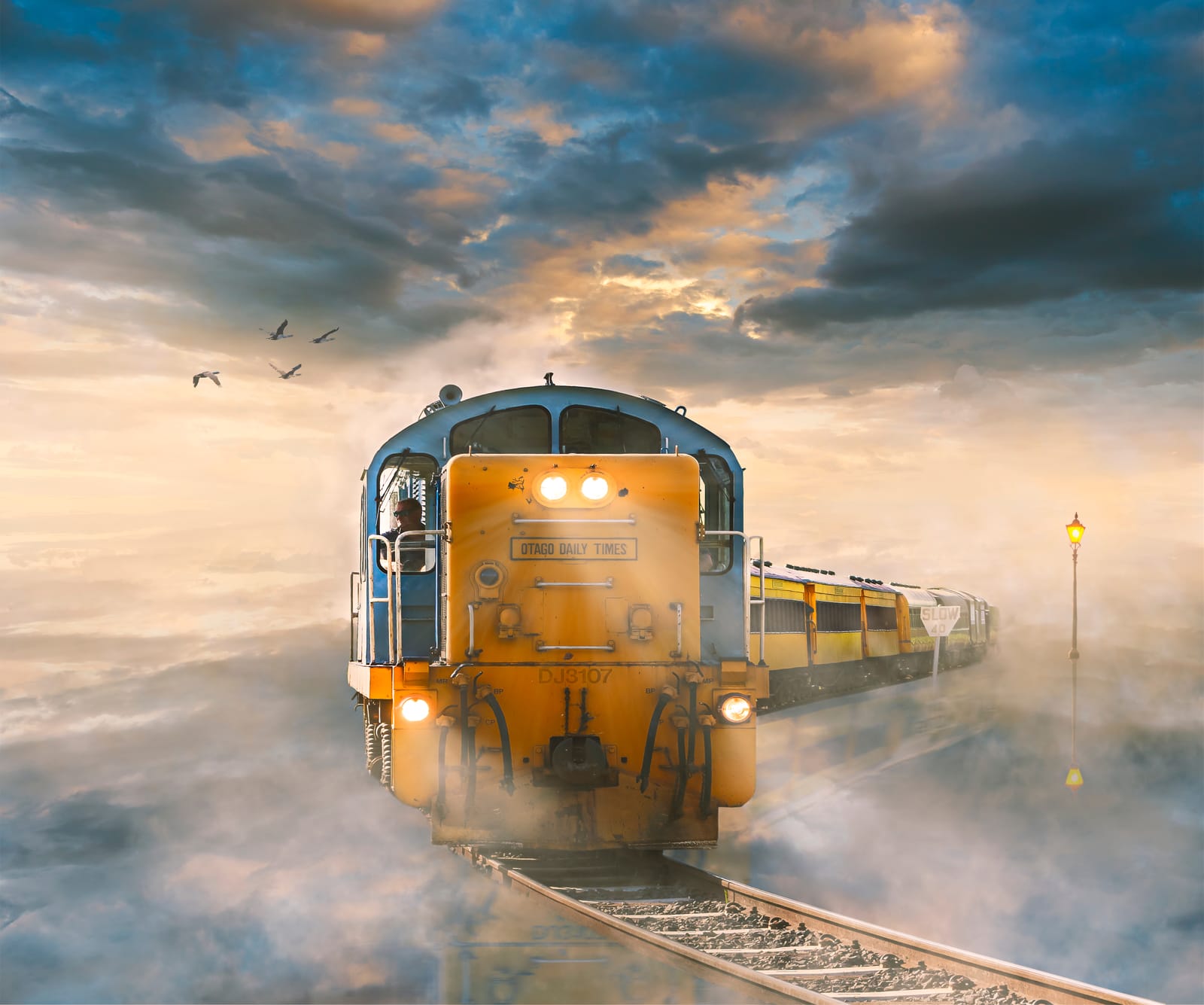 Train heading into the sunset