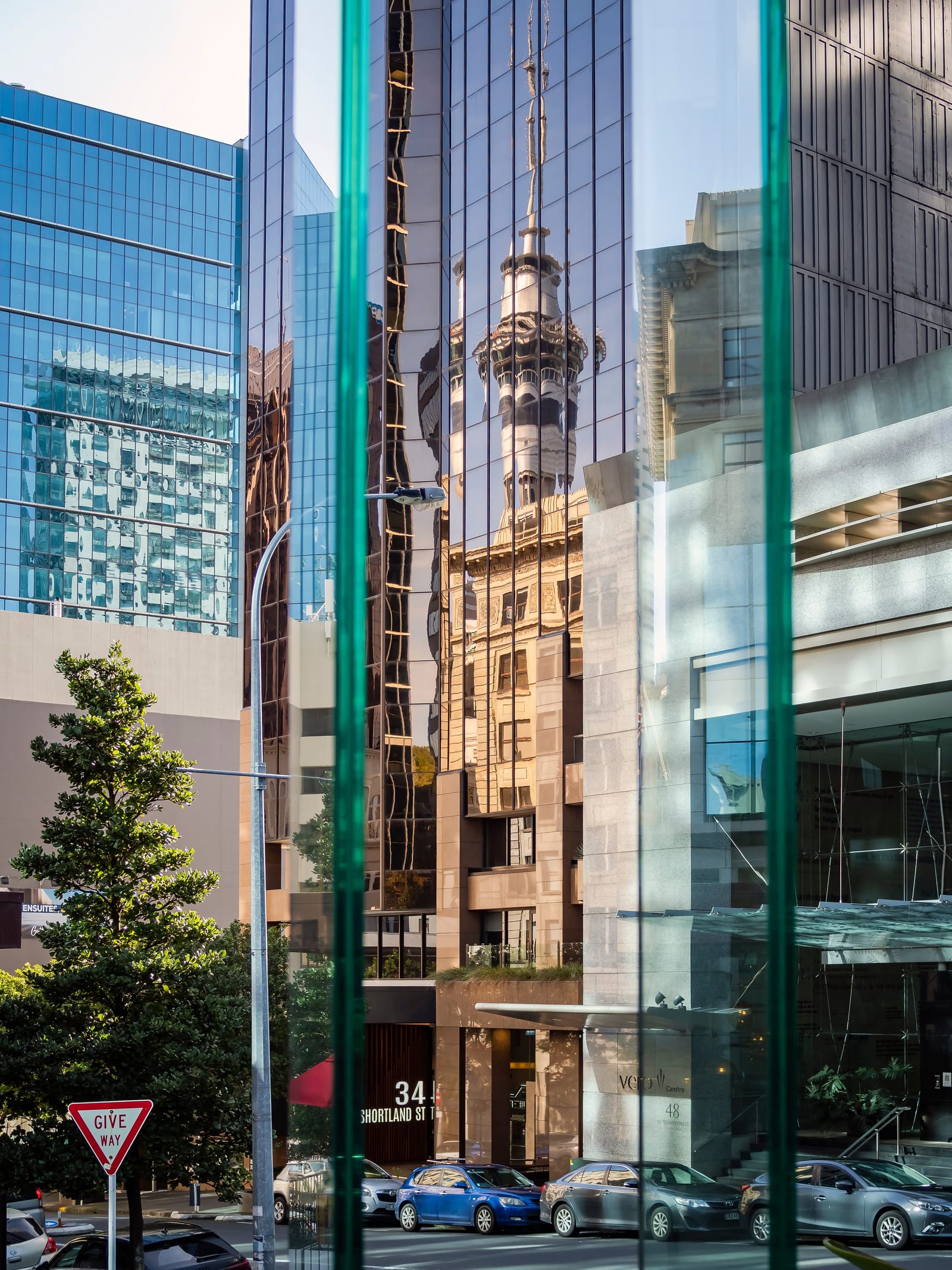 Auckland city sky tower building reflections