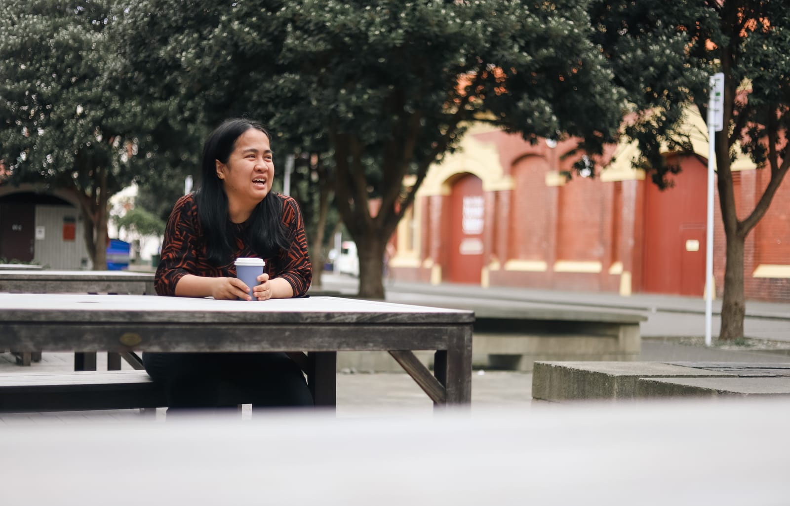 Woman enjoying coffee outdoors