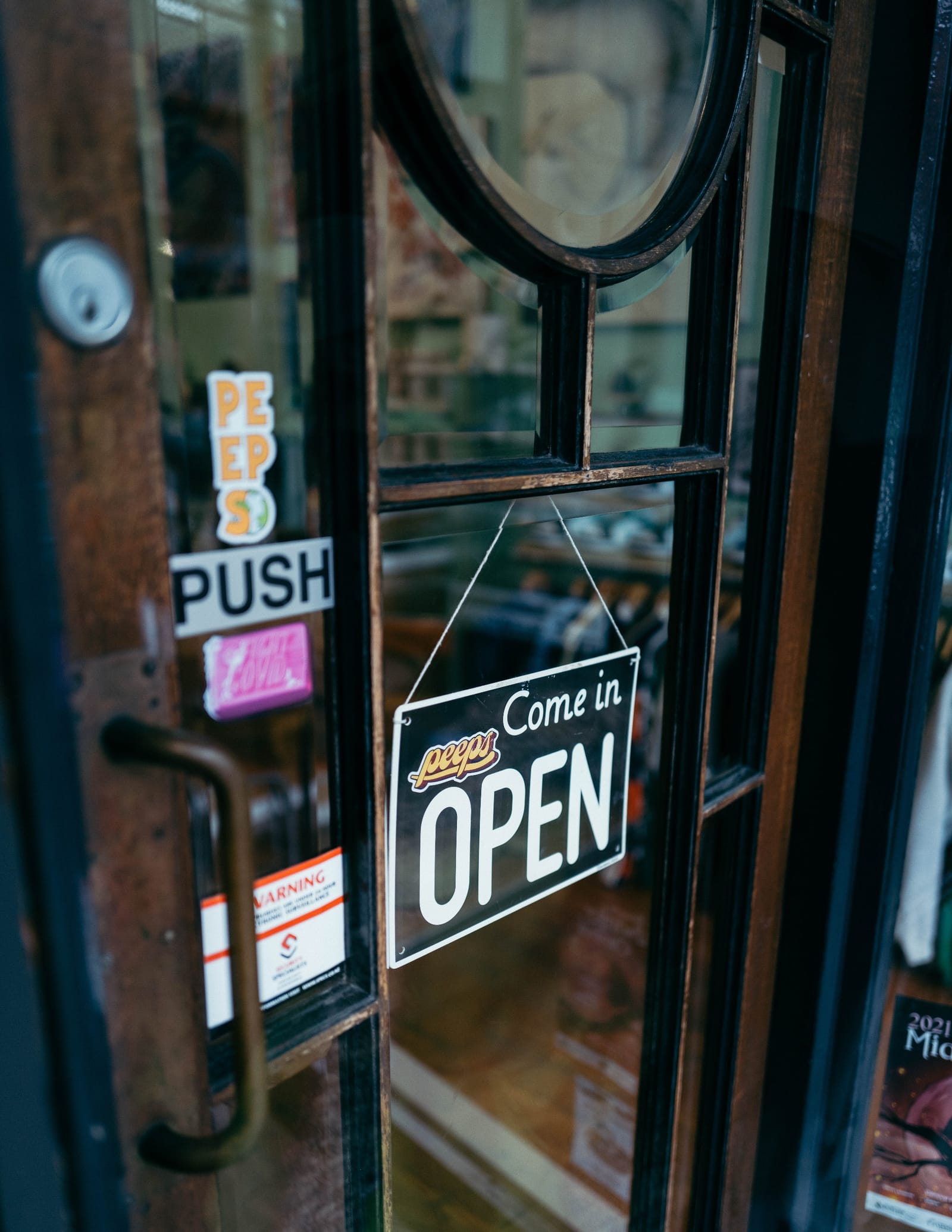 Shop door with OPEN sign