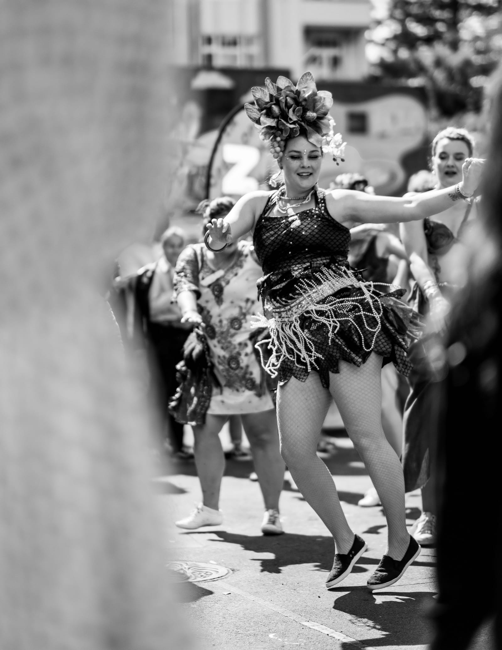 Street dancer in a floral headpiece