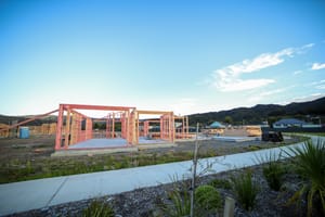 Partially framed house foundation post feature image