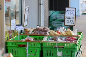 Vegetable market stall with prices post feature image