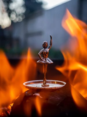 Ballerina Figurine Flames post feature image