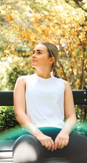 Girl seated on the bench post feature image