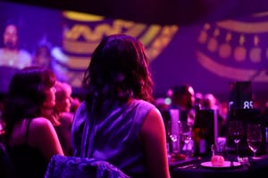 Woman sitting at the table post feature image