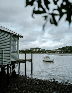 Coastal cabin and boat post feature image