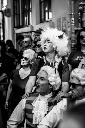 Historical costumes and a modern crowd post feature image