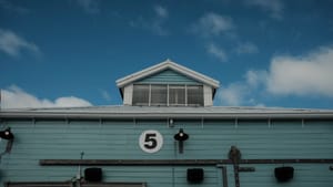 Light blue building with number 5 post feature image