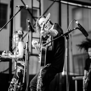 Live music performance with guitarist post feature image