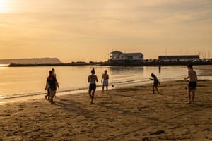 Playing on the beach at Plimmerton post feature image