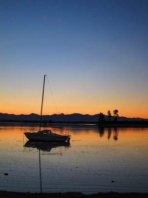 Sailboat at sunset post feature image