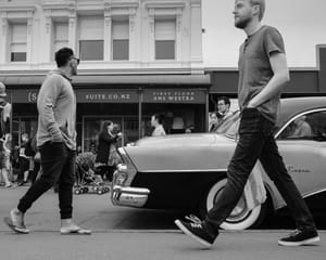 Vintage car and pedestrians post feature image