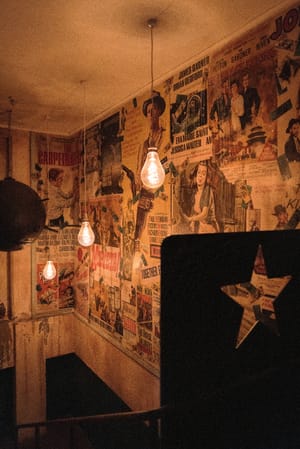 Vintage film posters in warm interior post feature image