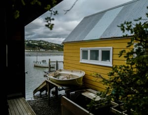 Yellow waterfront house post feature image